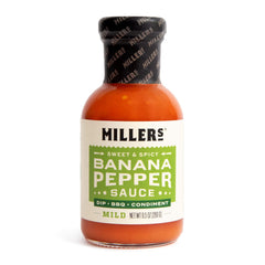 Millers Banana Pepper Mild Hot Sauce bottle pour demonstrates versatile wings and burgers usage.