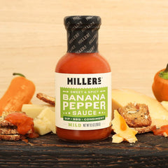Millers Banana Pepper Mild Hot Sauce ingredients display fresh peppers and spices.