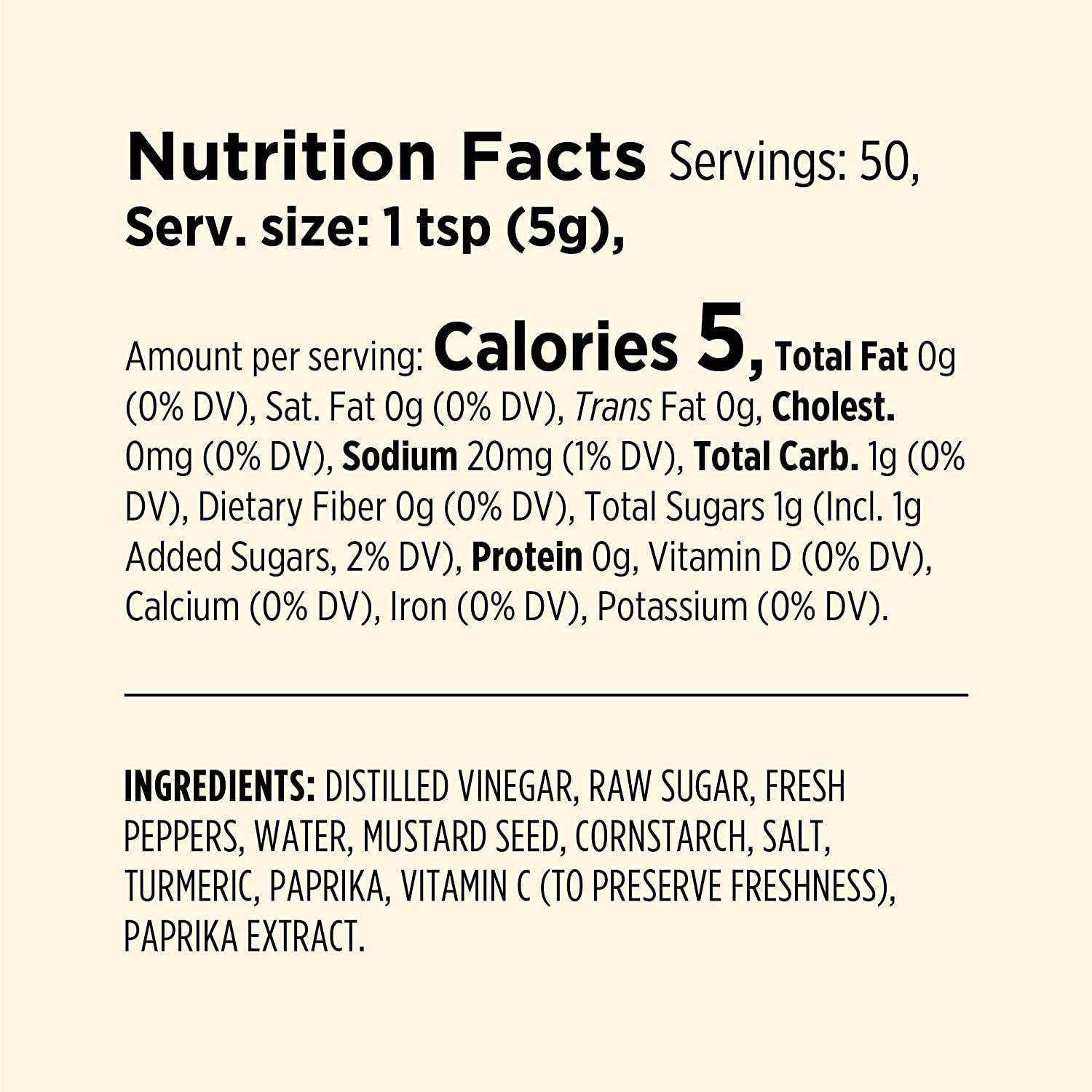 Millers Banana Pepper Mild Hot Sauce label closeup highlights its sweet-spicy profile.