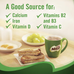 Scoop of MILO added to milk before mixing