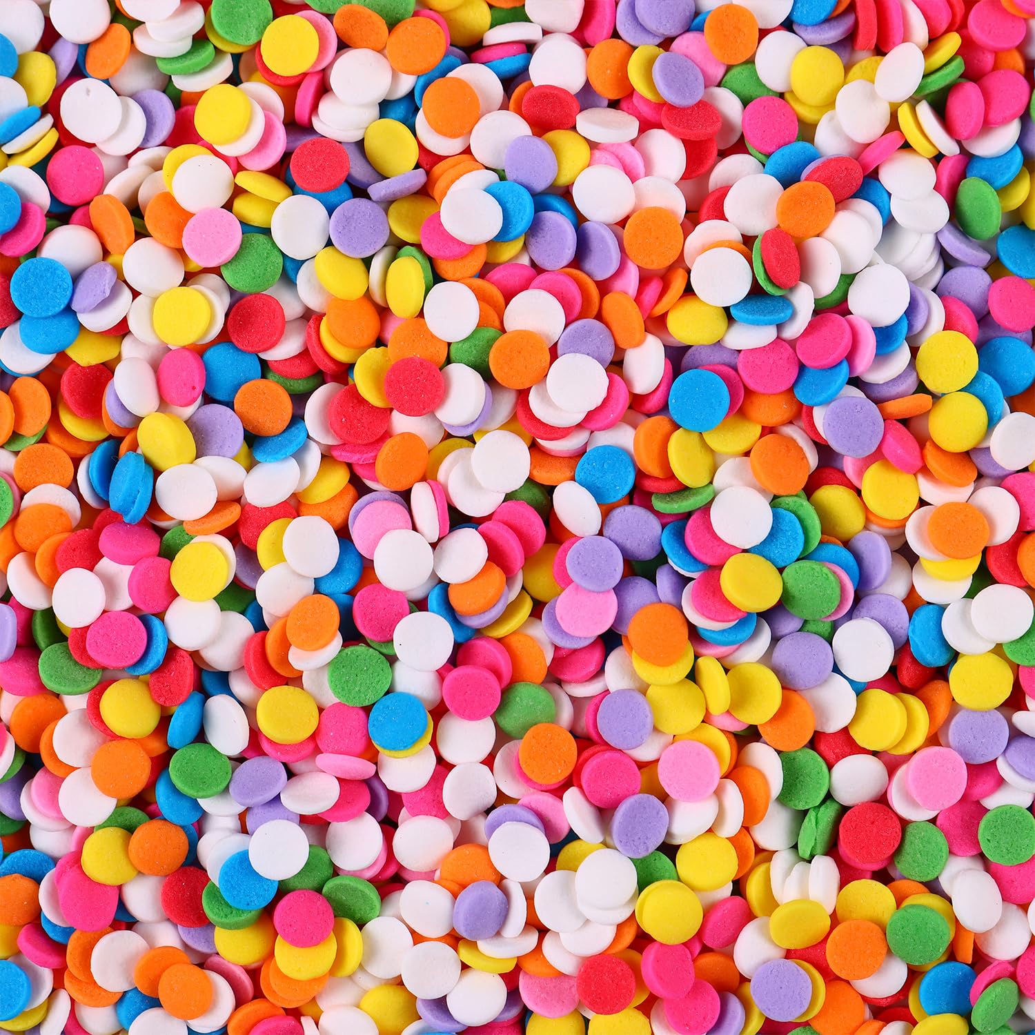 Milovin cupcake topping sprinkles finishing cupcakes with a dazzling rainbow
