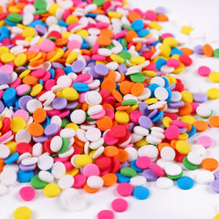 Milovin edible confetti sprinkles adding vibrant rainbow shine to a cake for celebrations