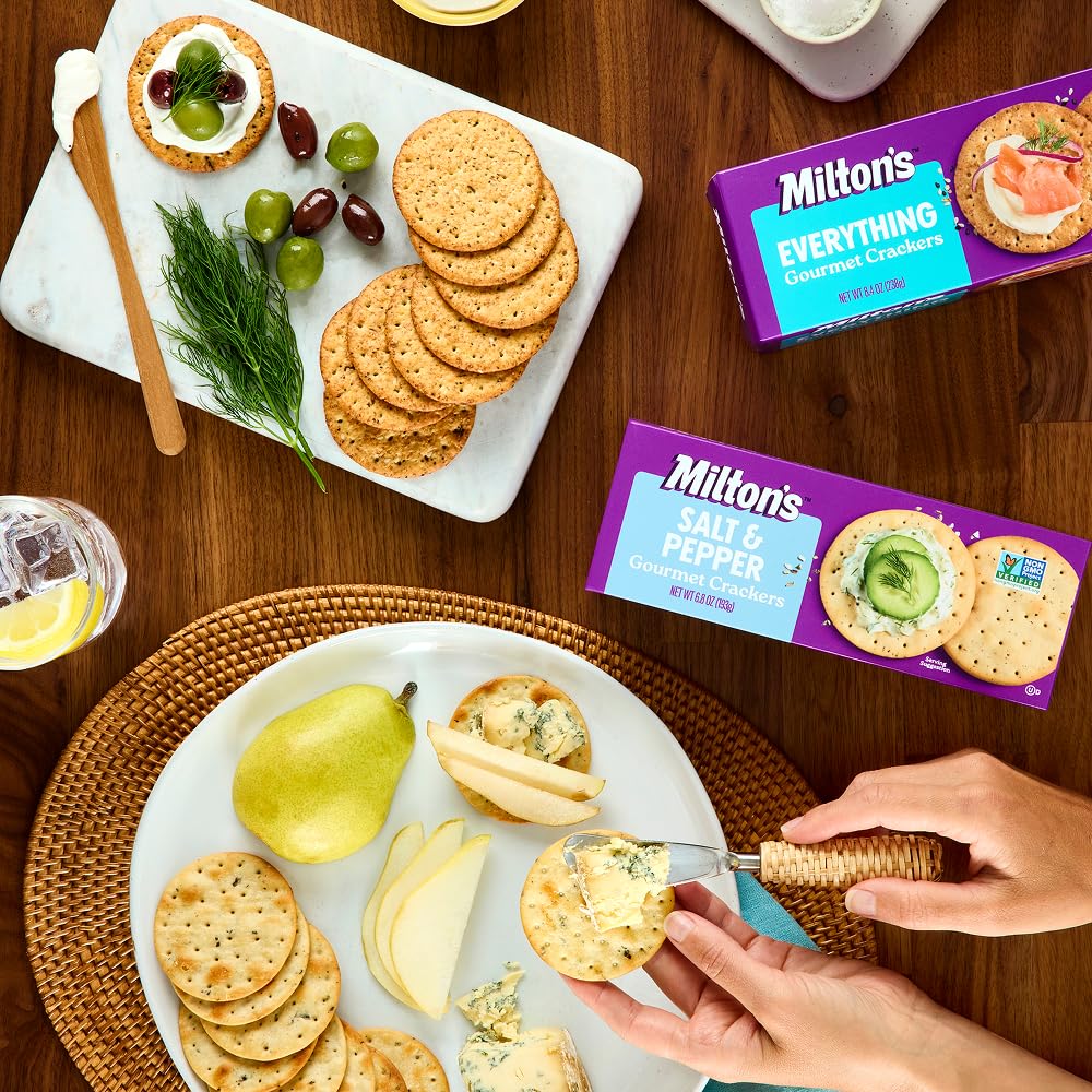Milton's Craft Bakers Everything Crackers stack; crispy bite enhances any tasting.