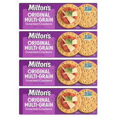 Milton's Craft Bakers Original Multi-Grain crackers displayed on a serving board for elegant entertaining.