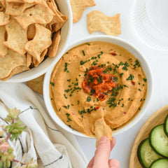 Milton's Craft Bakers crackers served with dips or soups for protein-enhanced meals.