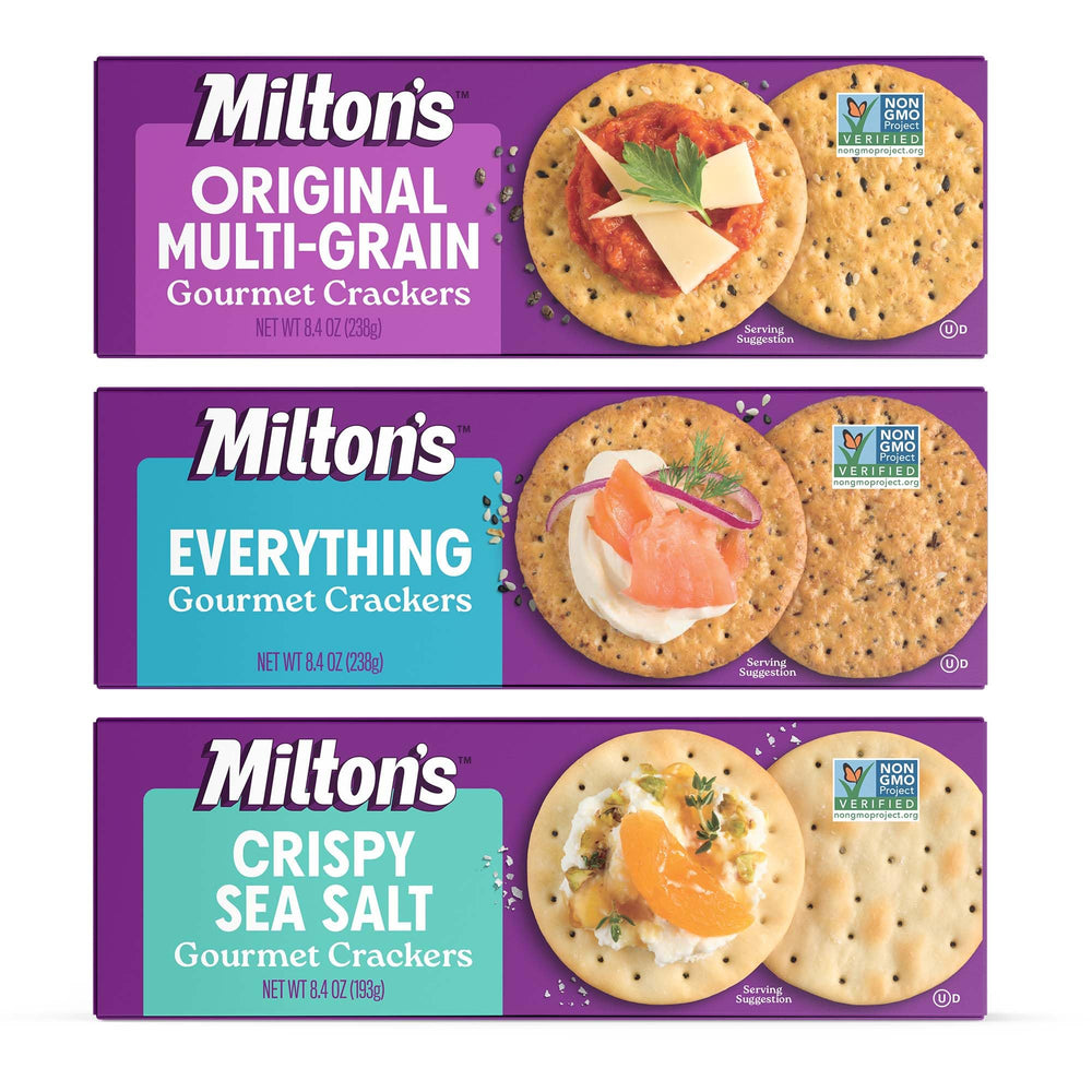 Milton's Original Multi-Grain crackers on a cheese board, ideal for gourmet entertaining.