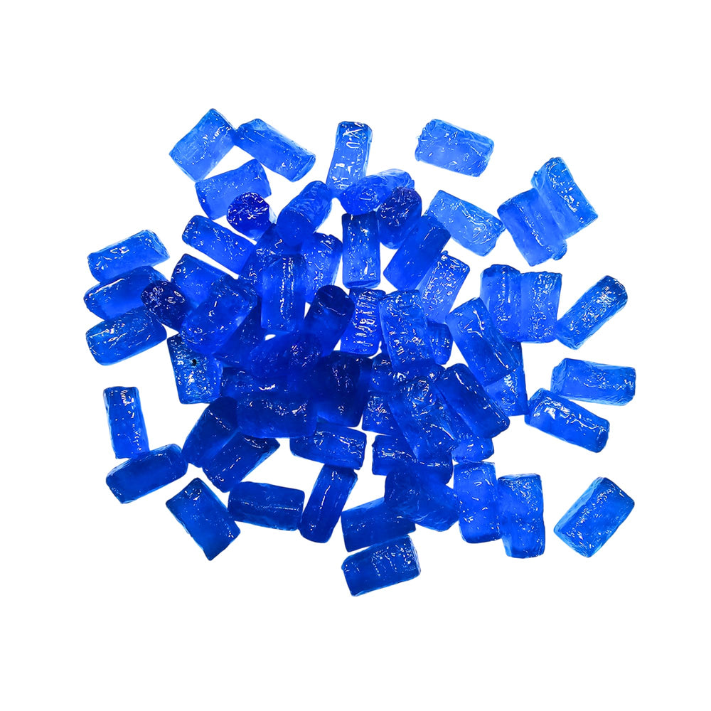 Closeup of vibrant blue raspberry candies from MIMA MIMA with glossy surfaces.