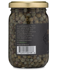 Mina Capers Non Pareil emerald pearl closeup displaying crisp texture