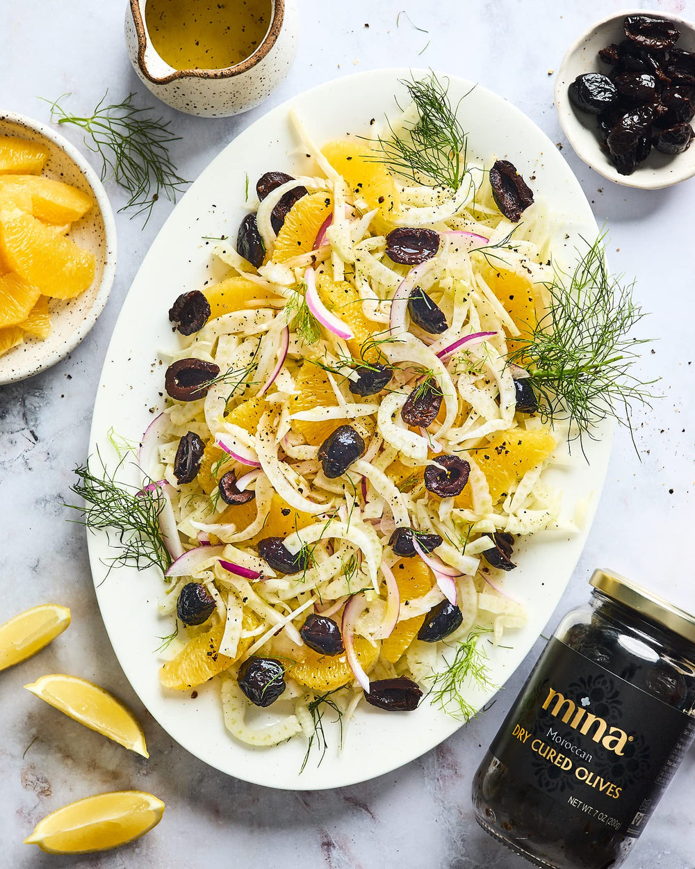 Mina dry cured black olives on antipasto platter for sharing