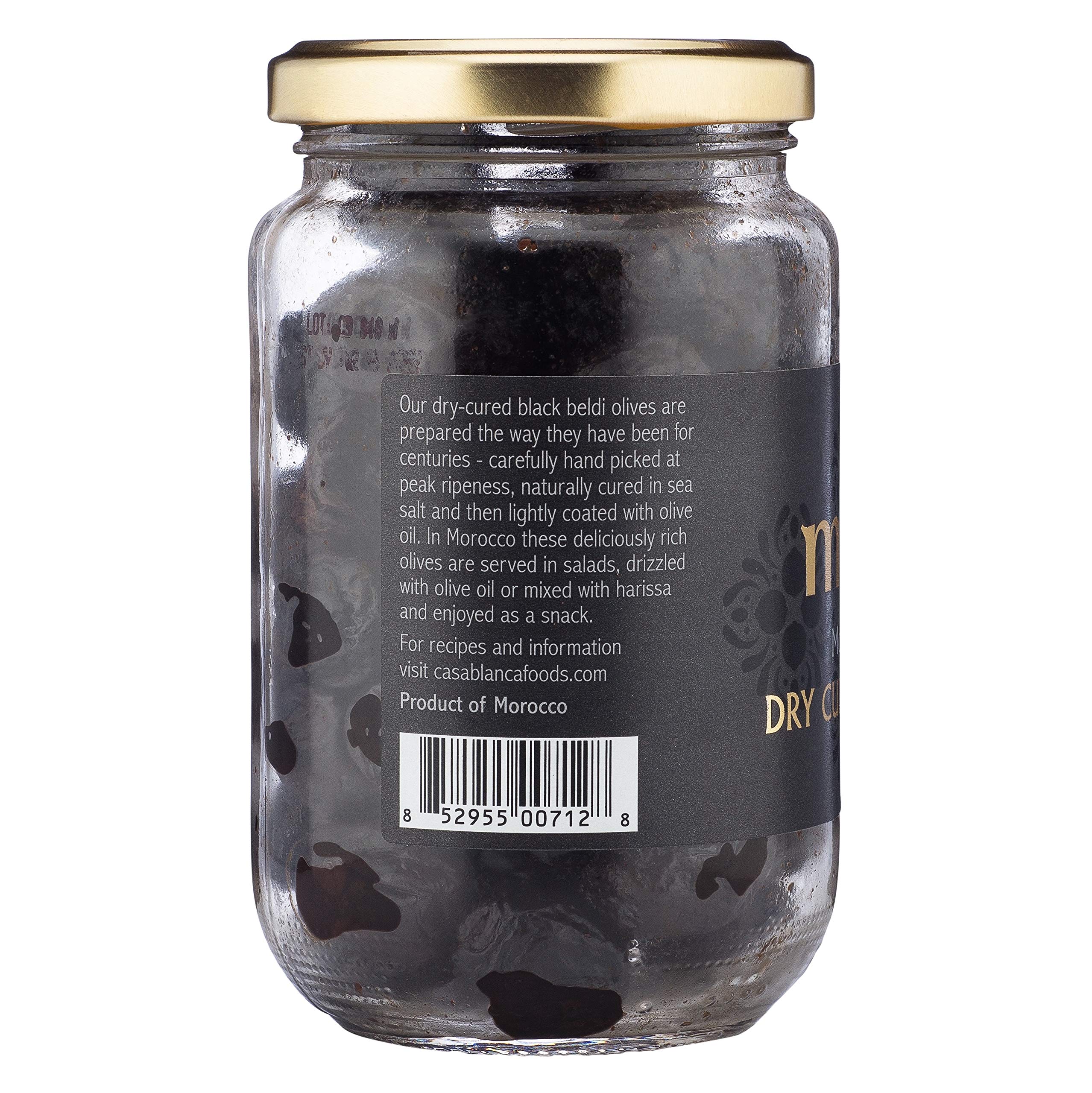 Mina dry cured black olives on appetizer plate for entertaining