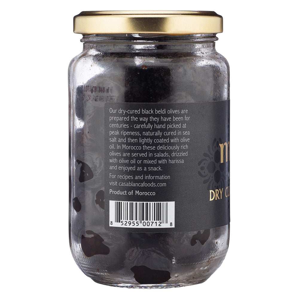 Mina dry cured black olives on appetizer plate for entertaining