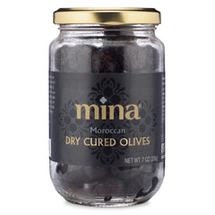 Mina dry cured black olives in a jar closeup highlighting natural flavor