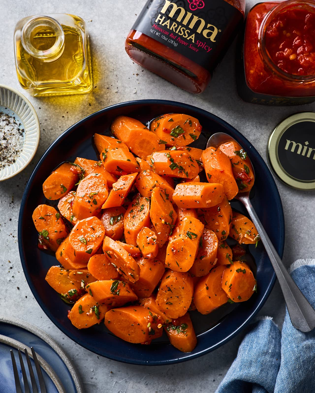Mina Harissa sauce texture shot shows glossy adaptable consistency for marinades.