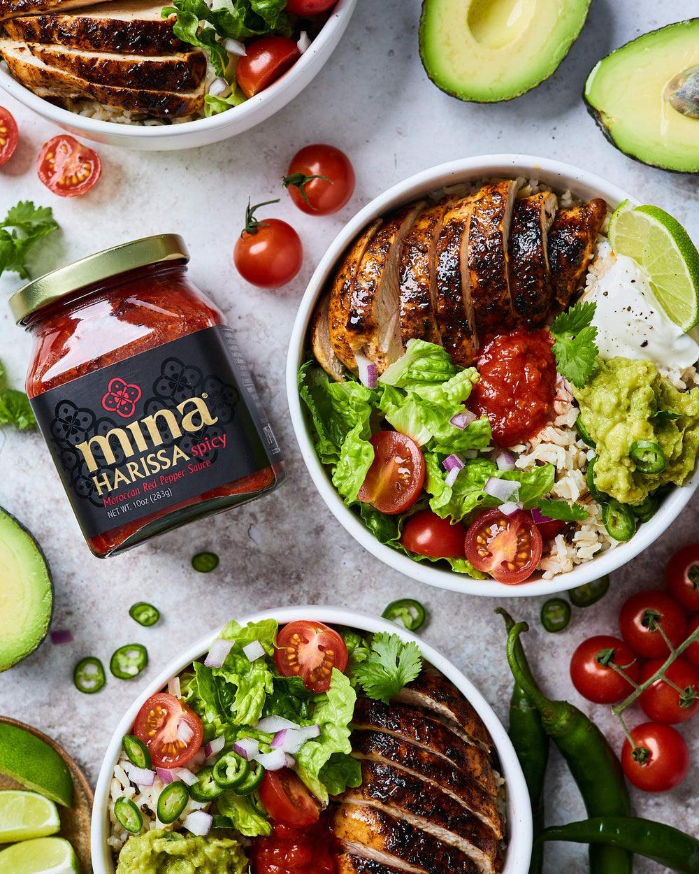 Close up shows Mina Harissa ingredients highlighting all natural non-GMO components for versatile cooking.