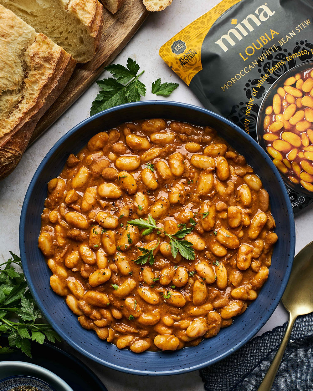Mina Loubia Moroccan White Bean Stew spices close-up hints at authentic flavor.