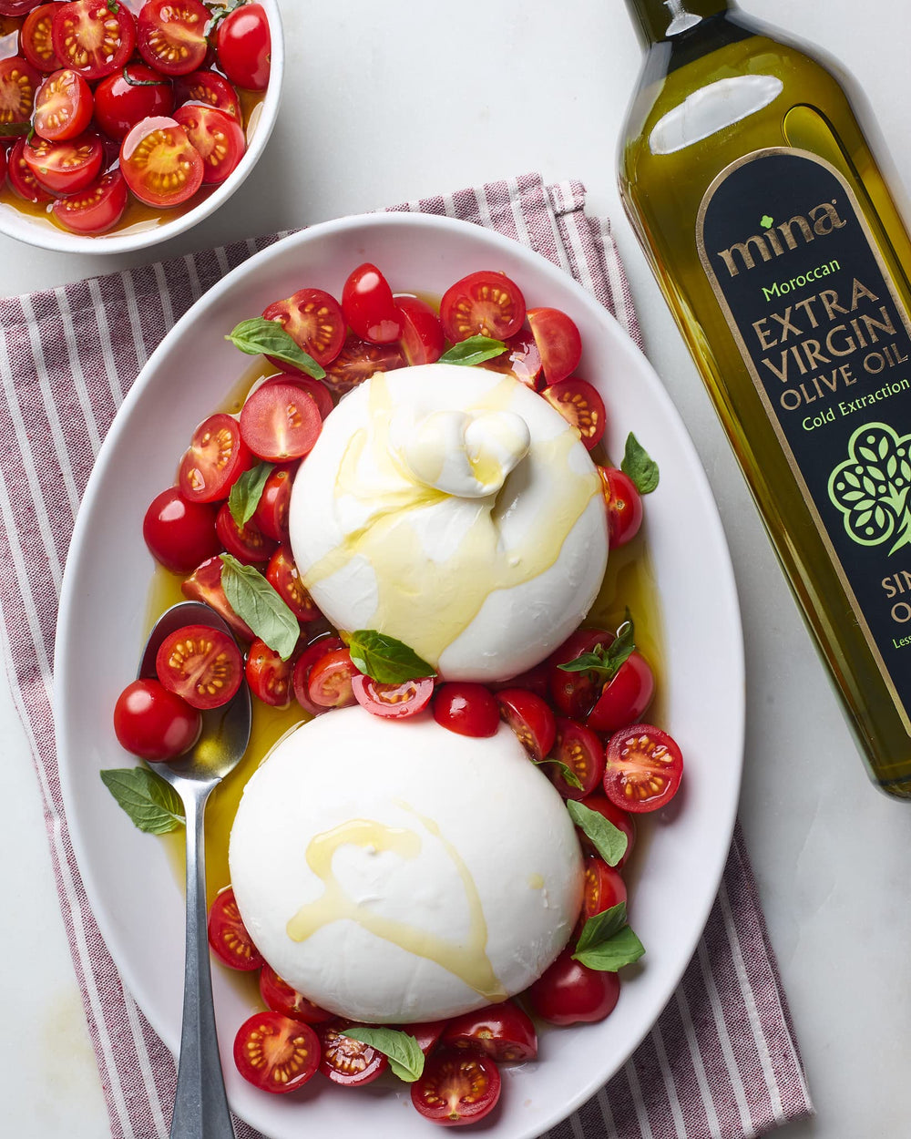 Mina Moroccan Olive Oil 2L bottle ready for family cooking use.