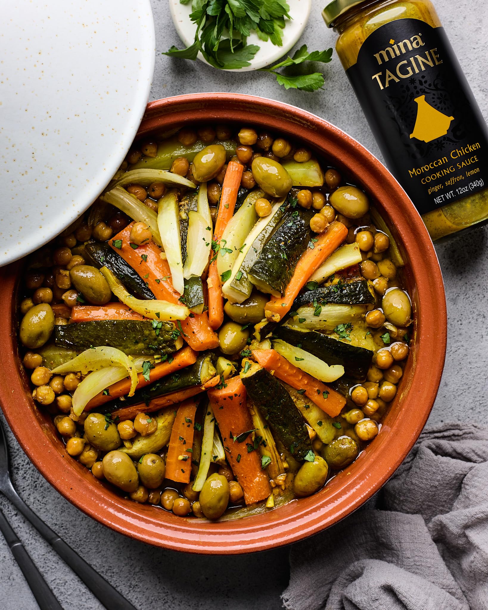 Mina Tagine lemon olive oil notes brighten vegetarian stews.