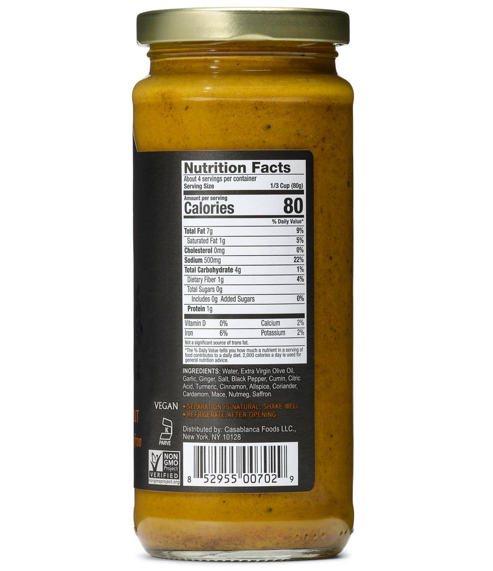 Close-up of Mina Tagine Sauce jar showing premium ras el hanout.