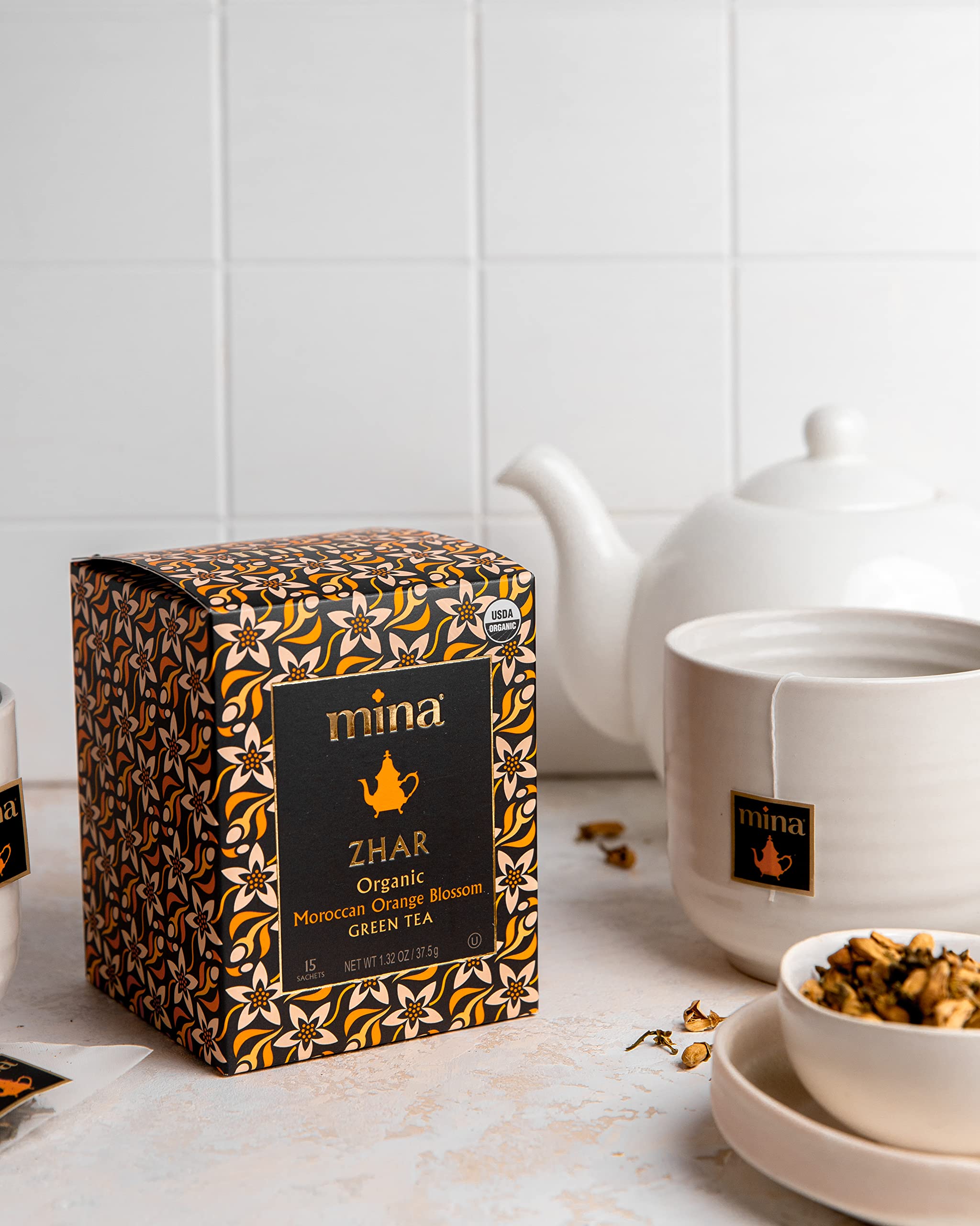 Mina Zhar tea bags being used hot or iced for versatile serving