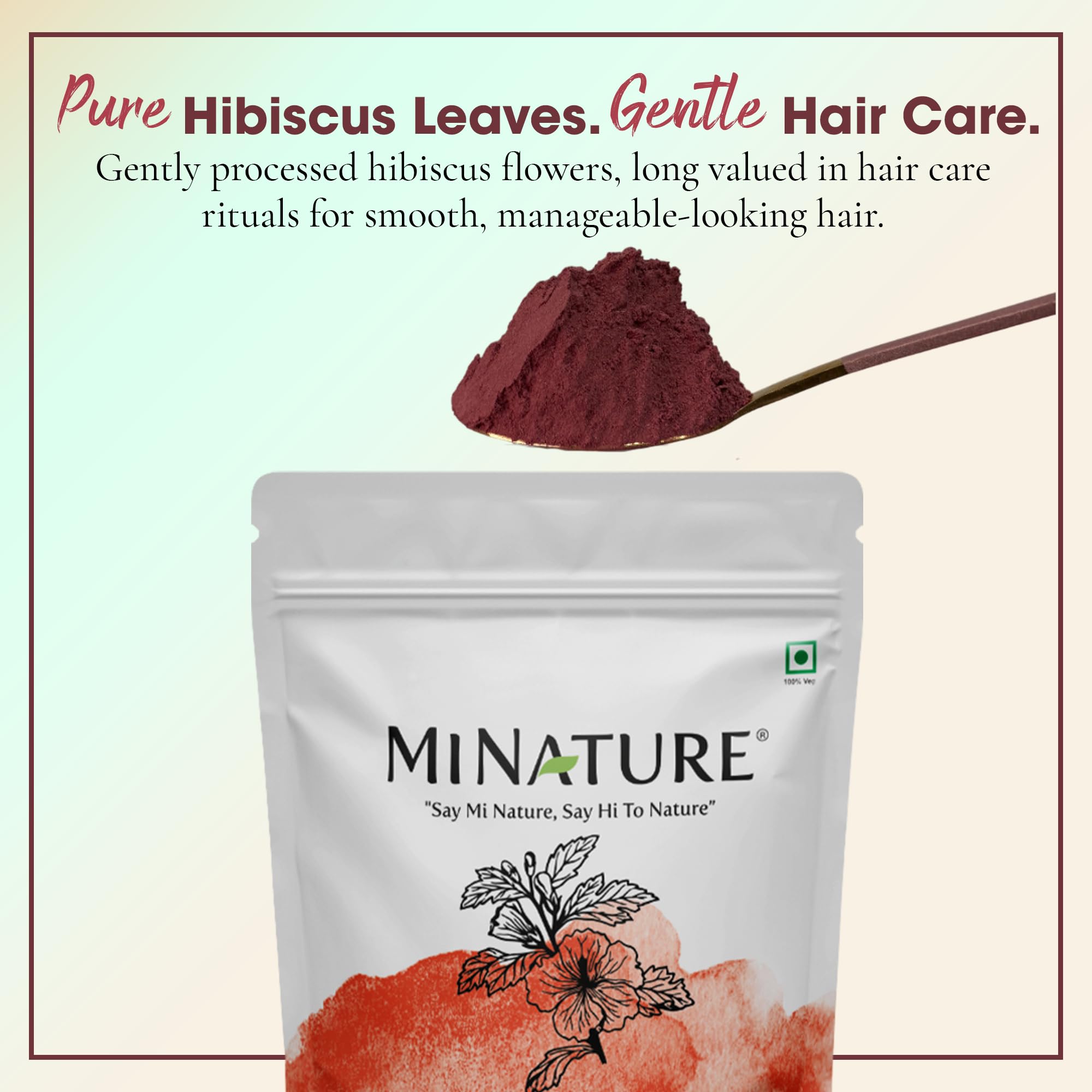 Minature hibiscus powder scoop beside jar for easy portioning