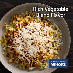 MINOR'S Mirepoix ingredients close-up with carrots, onions, and celery