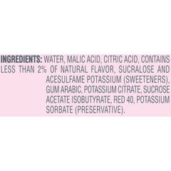 Glass of water with Mio Cranberry Raspberry for a berry twist