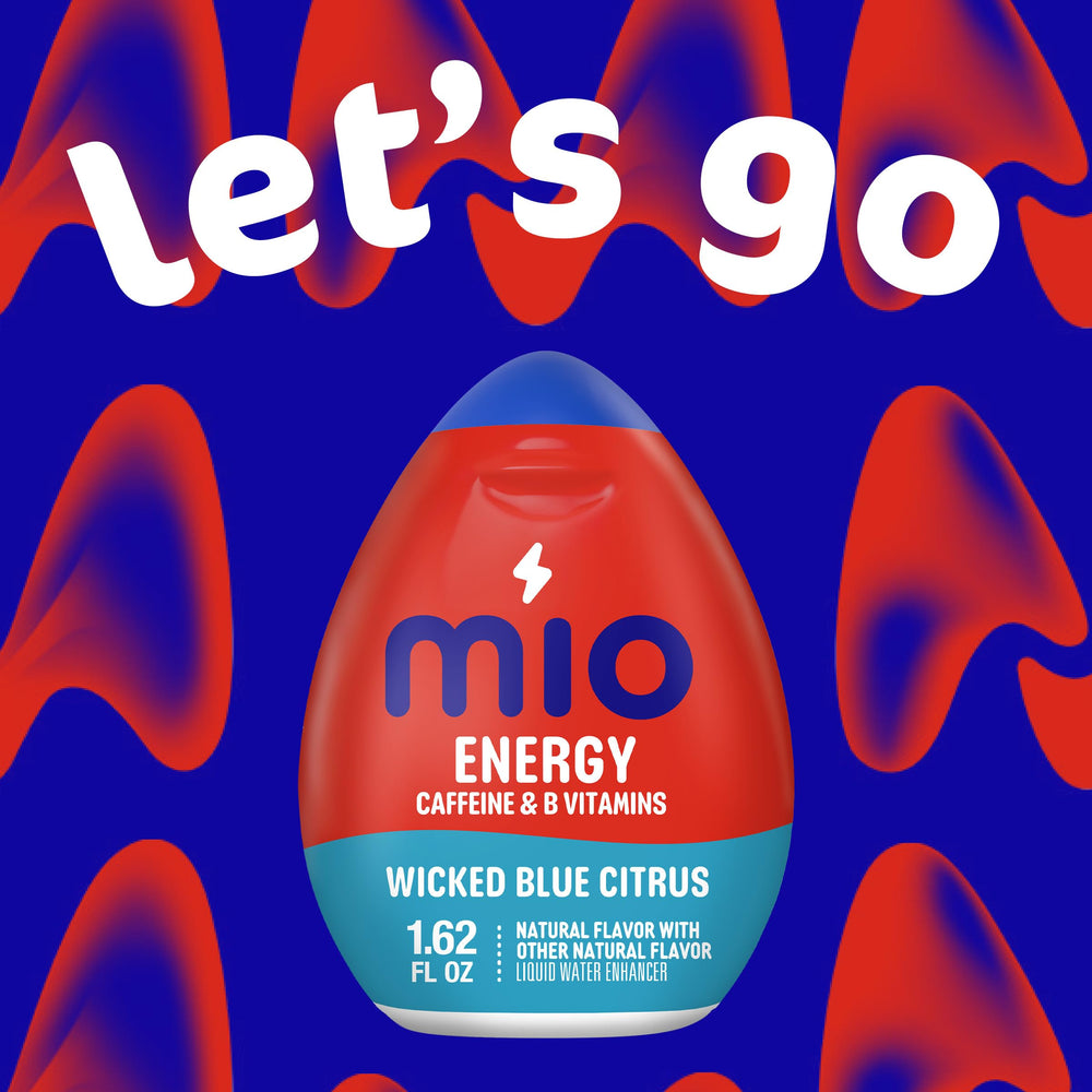 Mio Energy Wicked Blue Citrus drops dissolving in water with vibrant aroma.