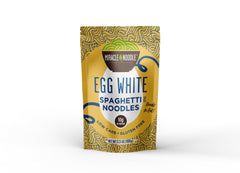 Miracle Noodle egg white spaghetti on plate with sauce, ready-to-eat.