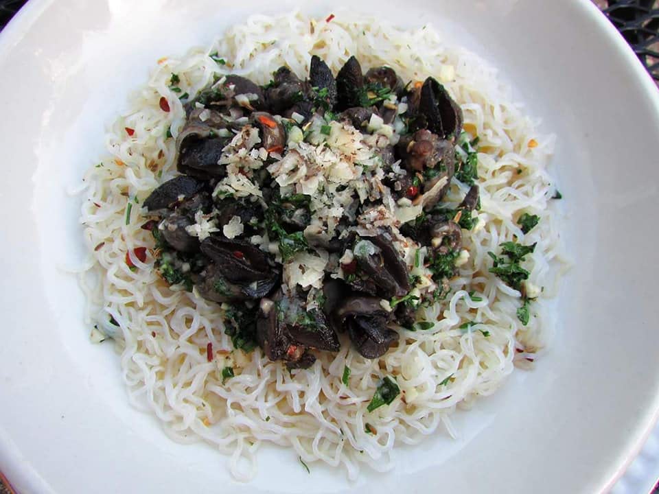 Miracle Noodle konjac pasta being heated in pan for a quick meal.