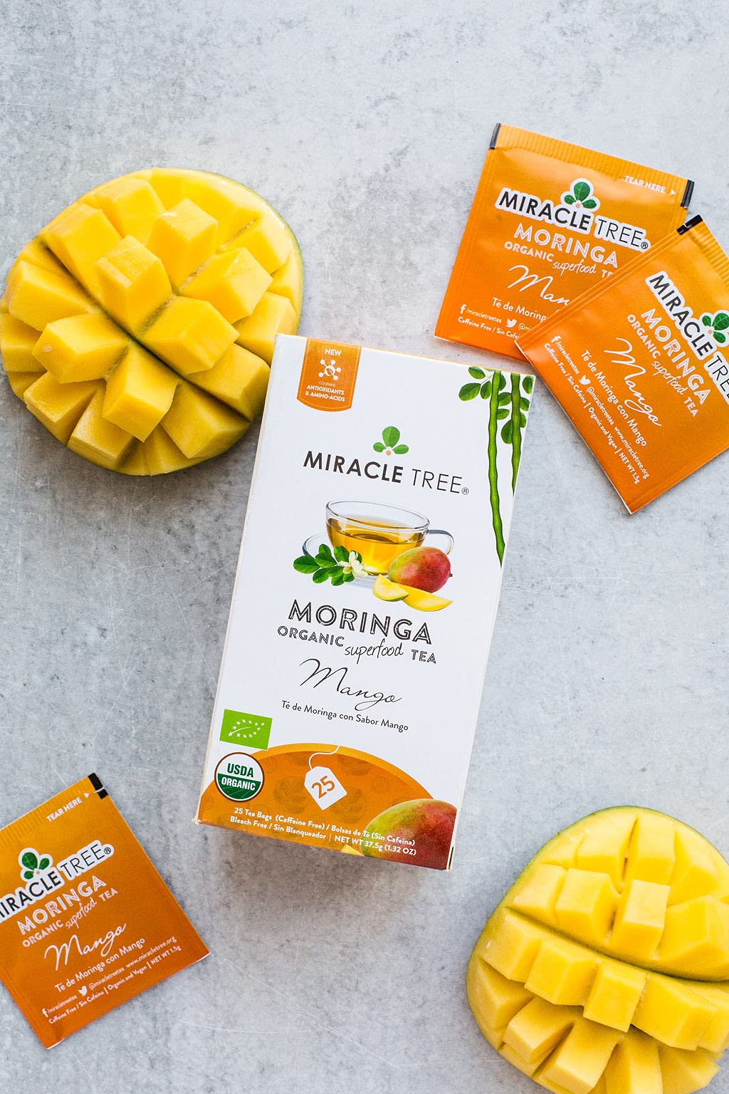 Miracle Tree Moringa Mango packaging emphasizes organic vegan ingredients.