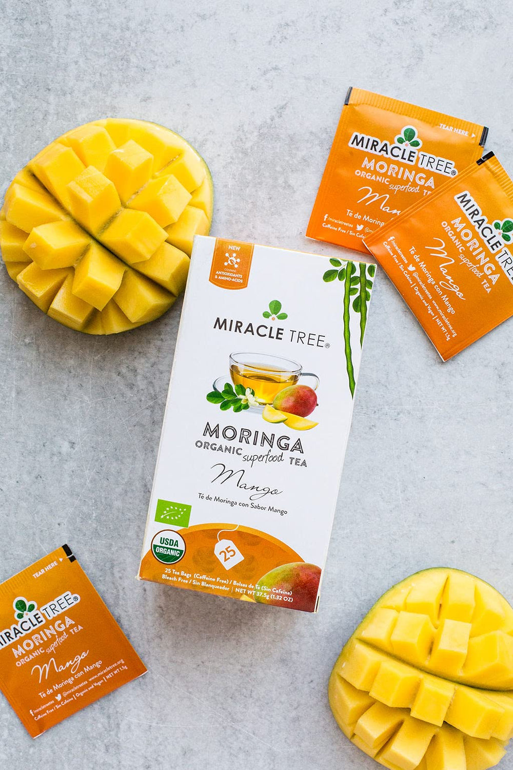 Miracle Tree Moringa Mango packaging emphasizes organic vegan ingredients.