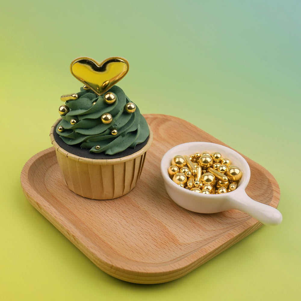 Miss Doozy Gold Sprinkles on cupcake adds sparkle and texture.