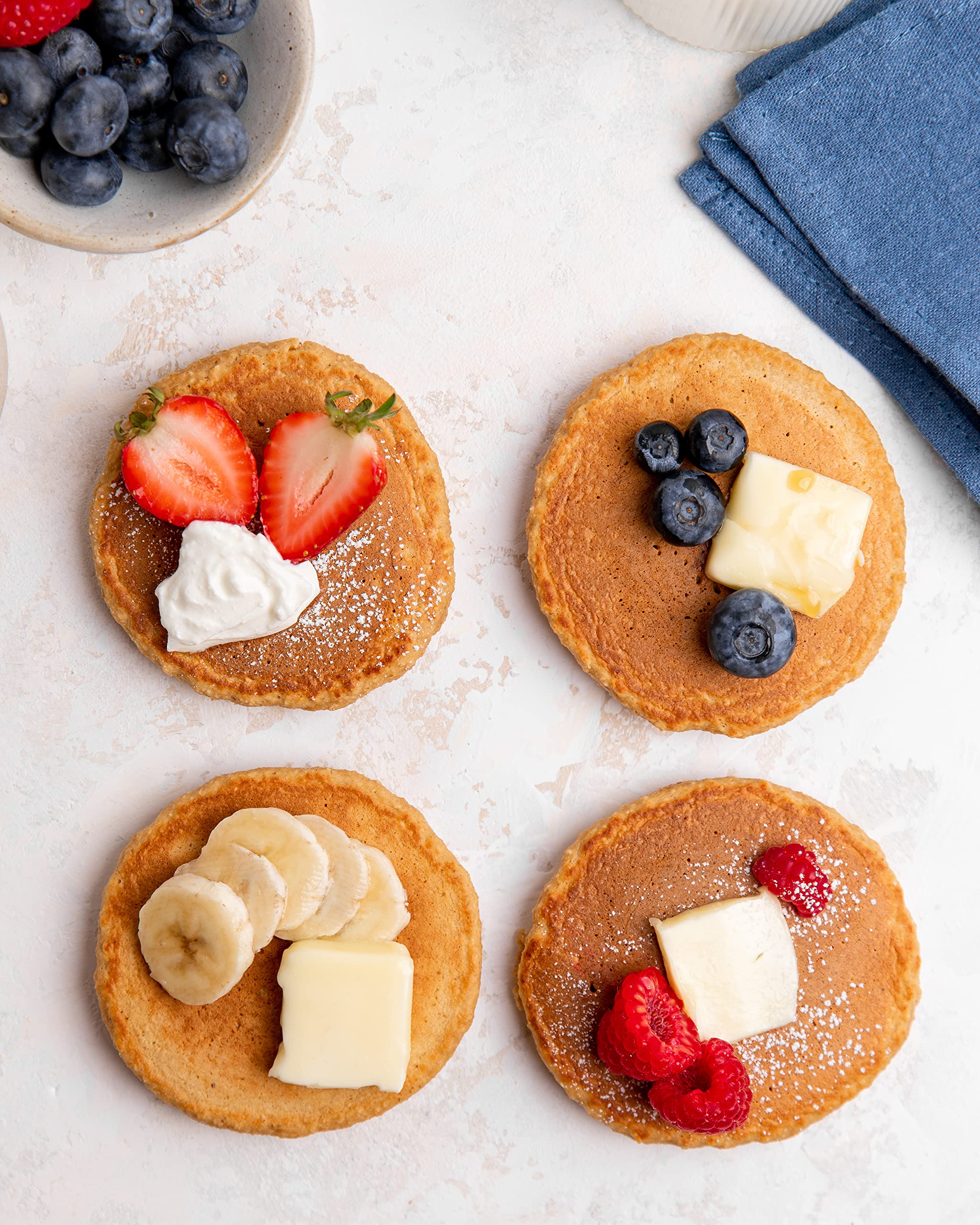 Miss Jones Baking Oat Pancake Mix serving plate with fruit and maple syrup