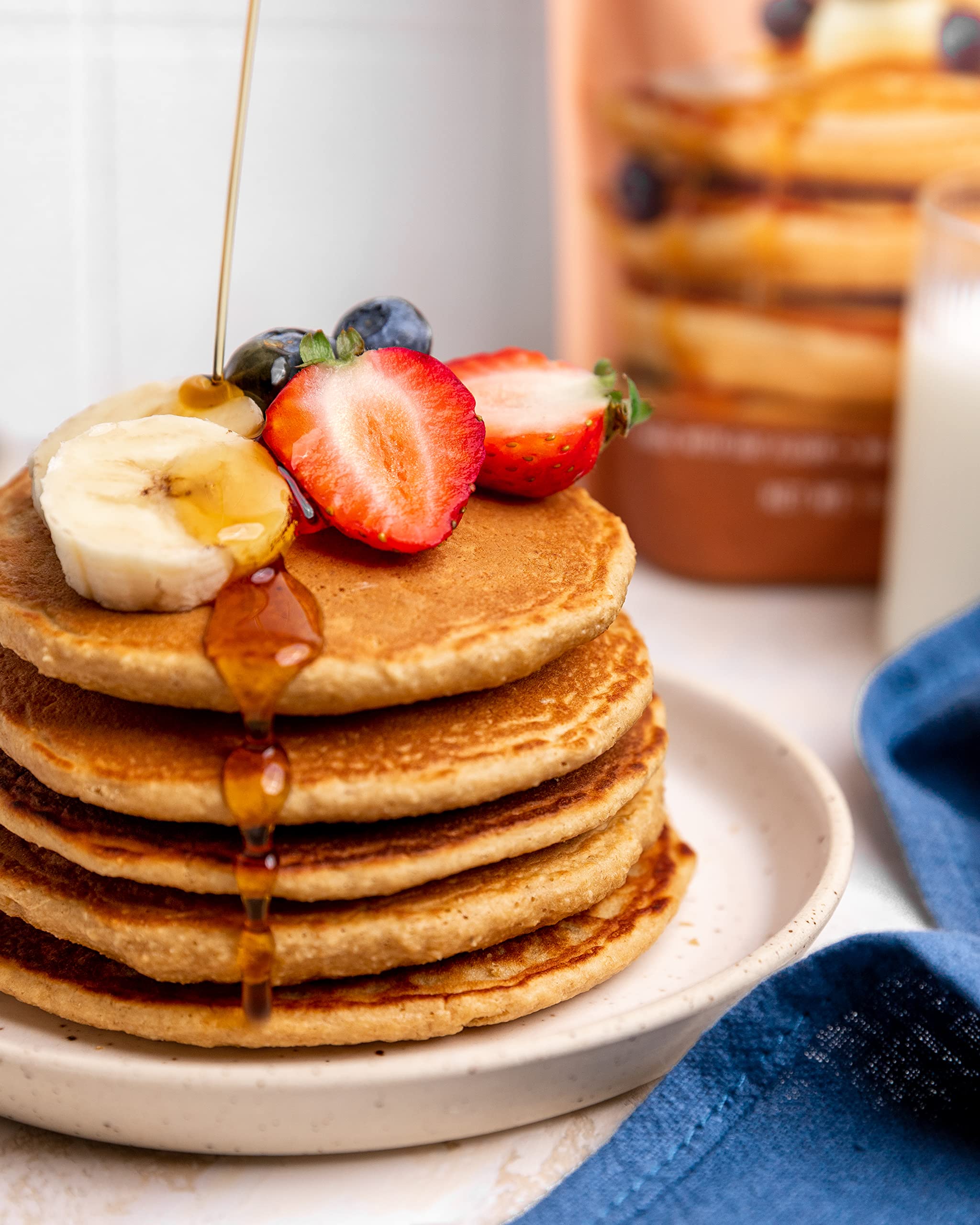 Miss Jones Baking Original Oat Pancake Mix with a measuring cup for precise portions