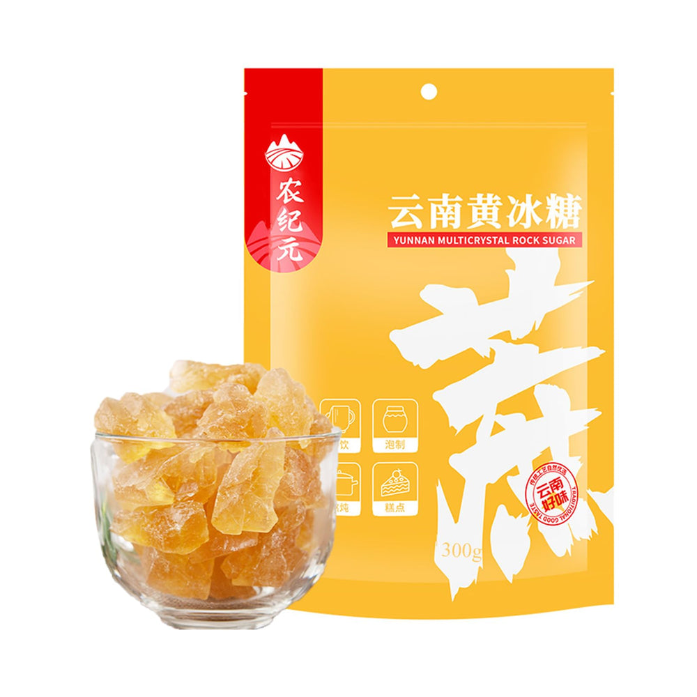 Mkostlich yellow rock sugar crystals in a jar for pho.