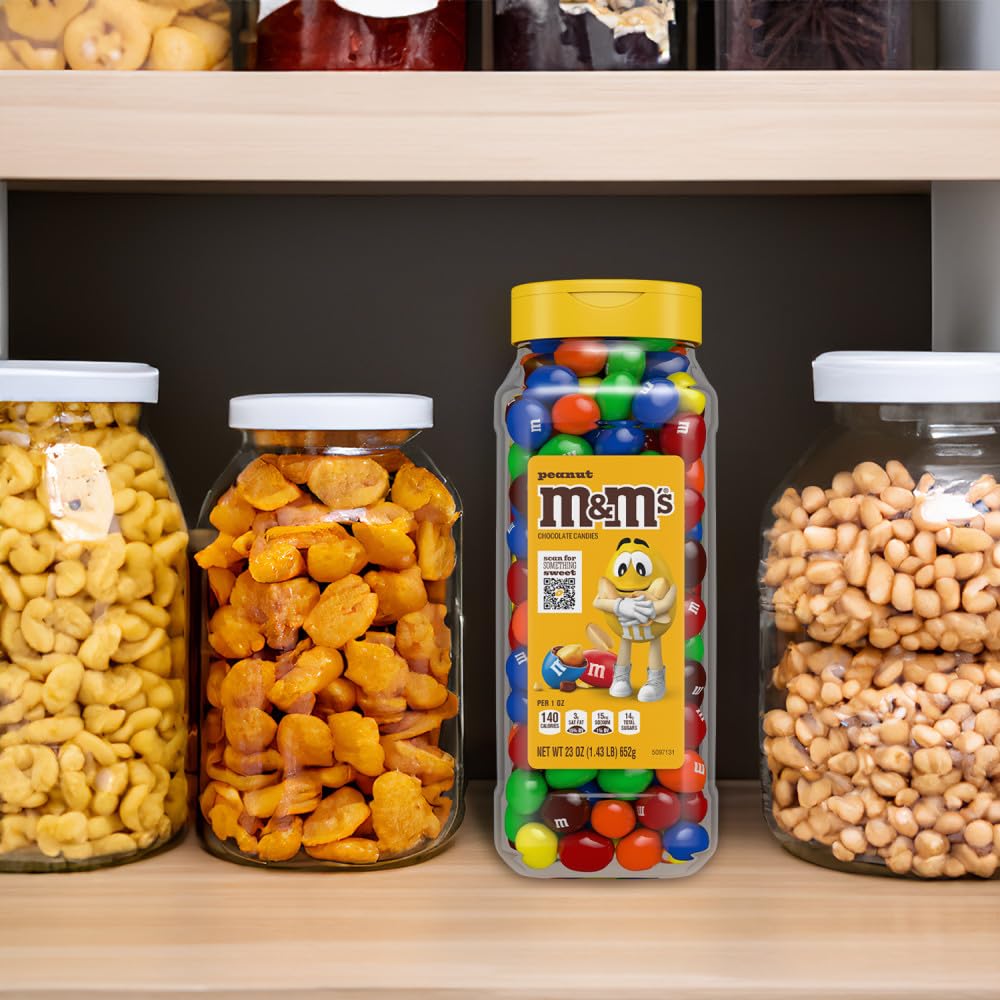 M&M'S party buffet setup with jars, easy sharing for guests.