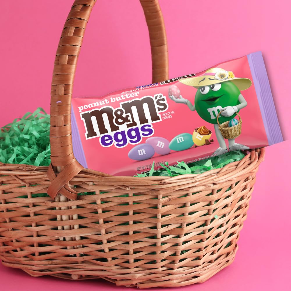 M&M'S Peanut Butter Eggs on a dessert table, topping Easter pastries.