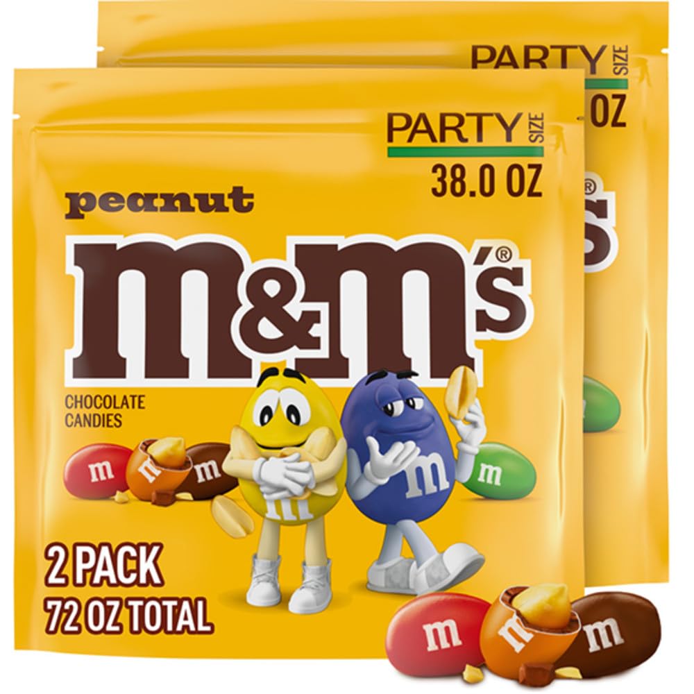 M&M'S Peanut Milk Chocolate candy bags on a party table, colorful shells inviting guests to share.