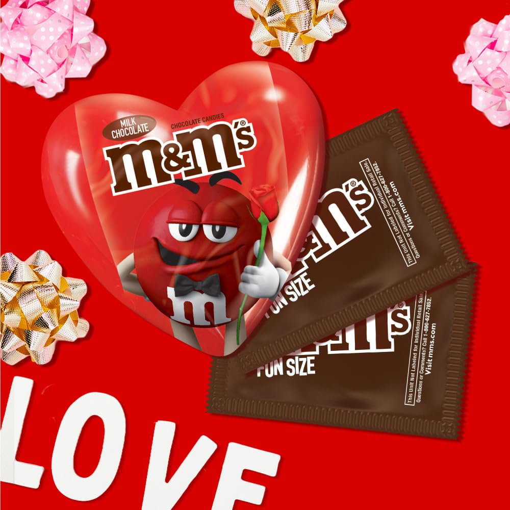 M&M'S box pairs with roses for a sweet desk centerpiece.