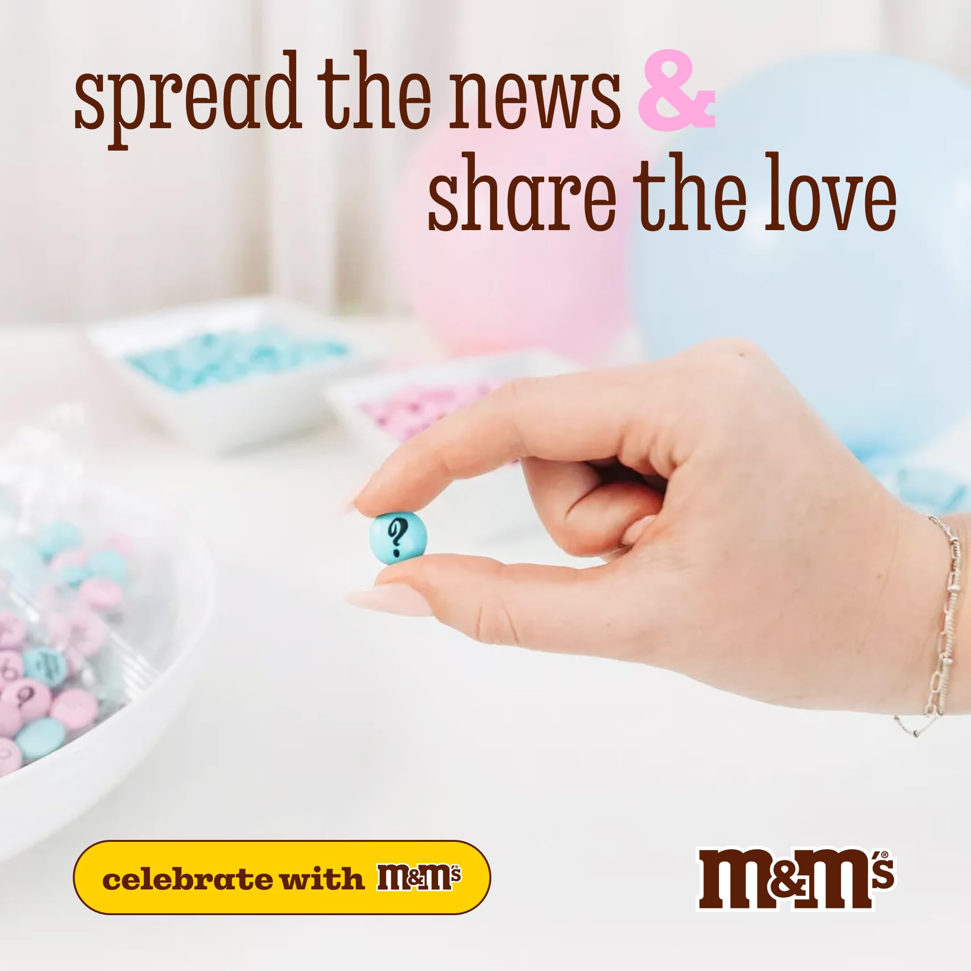 Baby shower favors featuring colorful M&M'S for guest keepsakes.