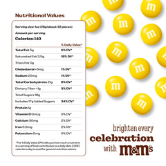 Open M&M’S World bulk bag pouring candy into a party bowl.