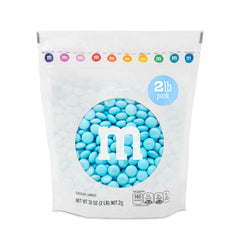 M&M'S WORLD light blue milk chocolate candy bulk on display for party decor and gifts.