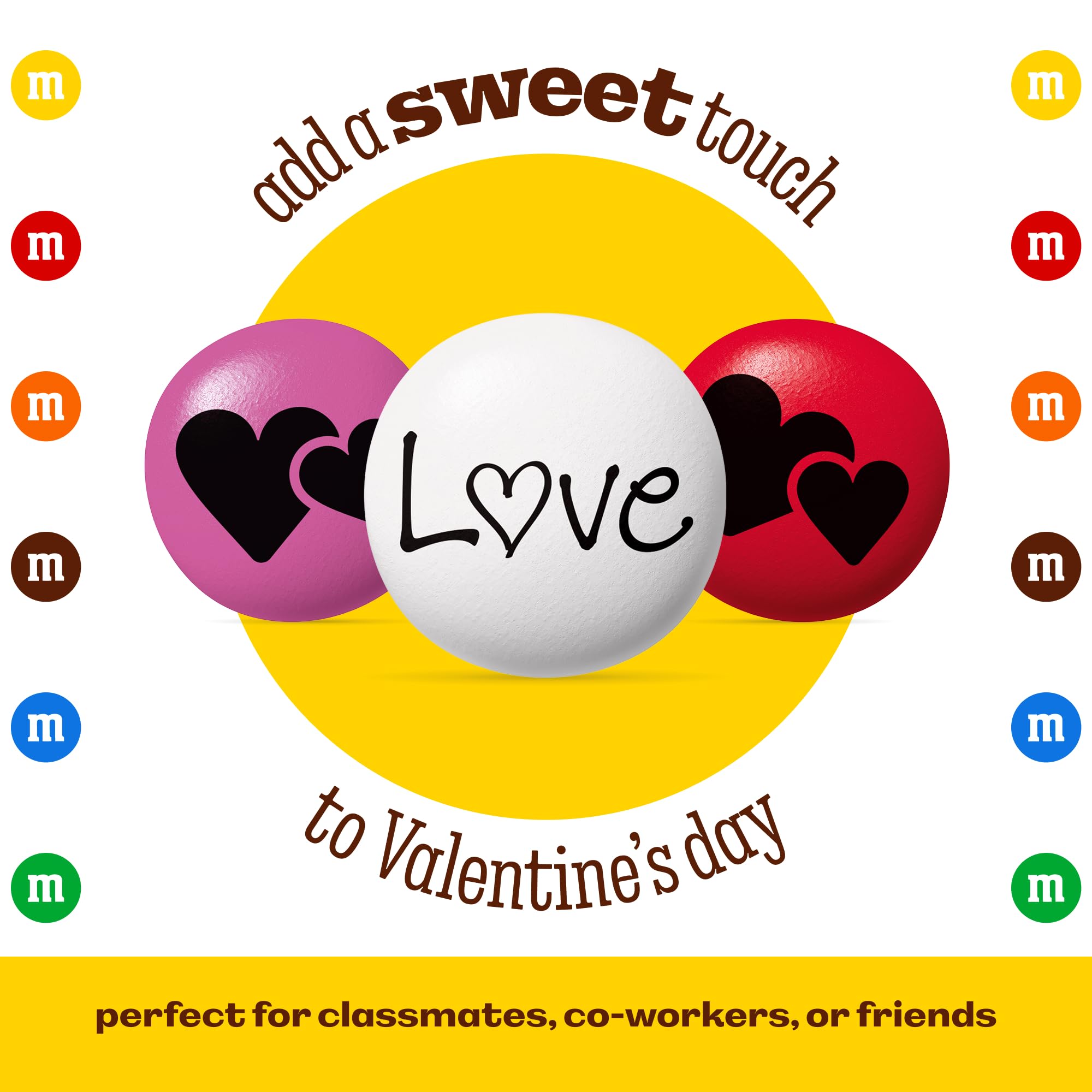 M&M’S WORLD love-printed candies closeup showcases red, white, and pink M&M’S with LOVE.