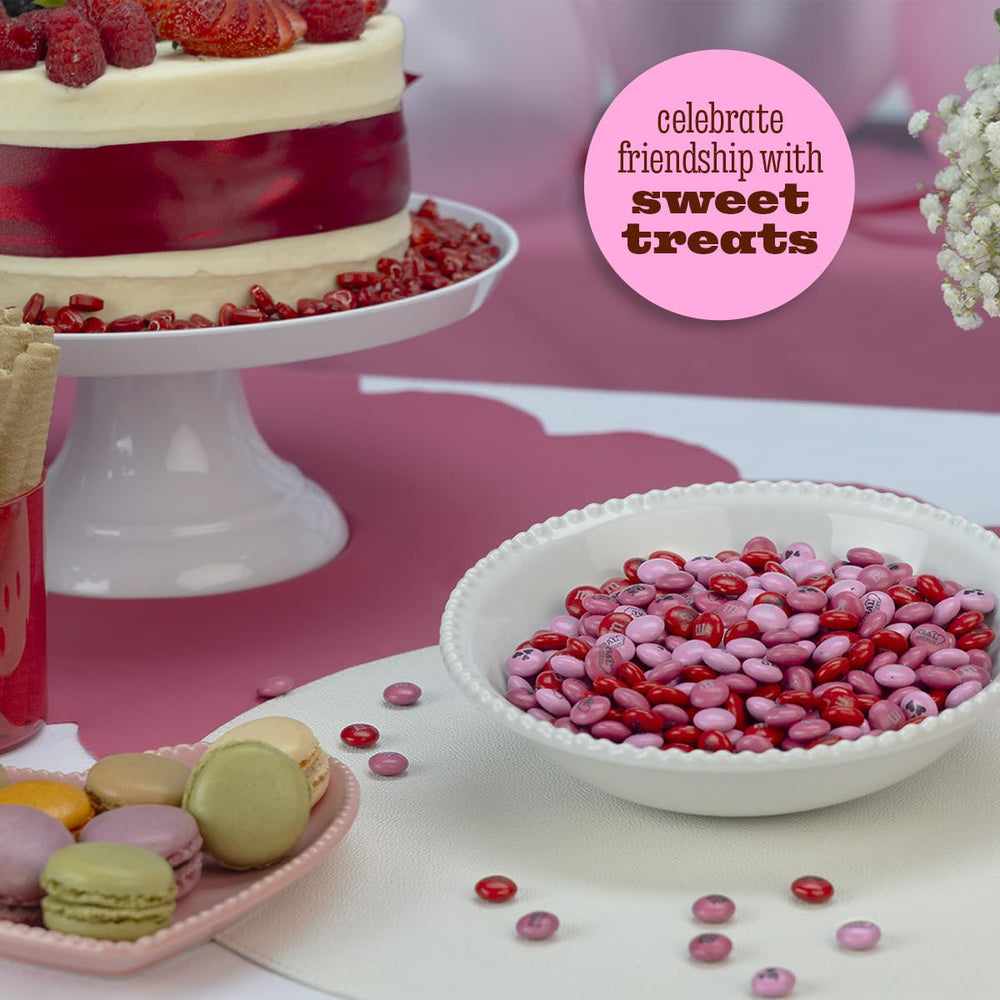 Colorful candy bowls for DIY party favors with a Galentine’s theme.