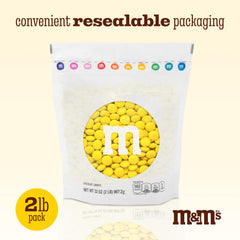 M&M’S World party favors setup with bulk candy in jars.