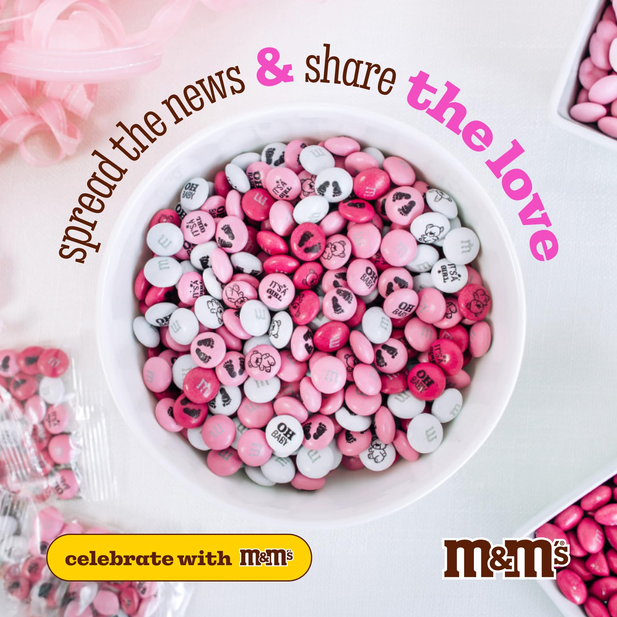 M&M'S World It's A Girl designs featuring baby footprints on candy.