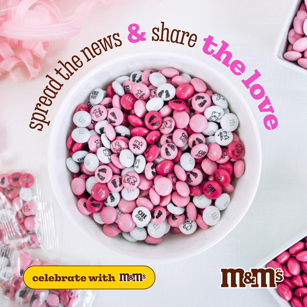 M&M'S World It's A Girl designs featuring baby footprints on candy.