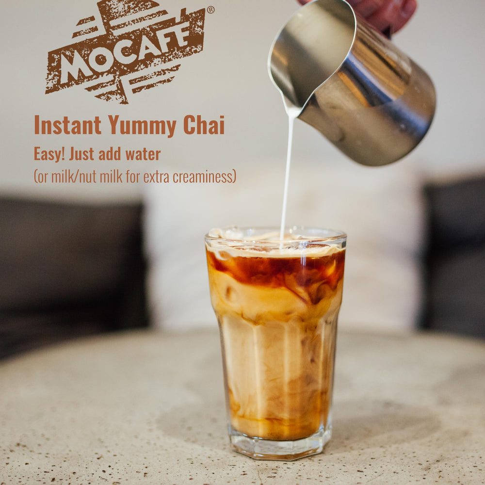 MOCAFÉ chai latte glass with steam demonstrates luxurious, ready-to-drink indulgence at home.
