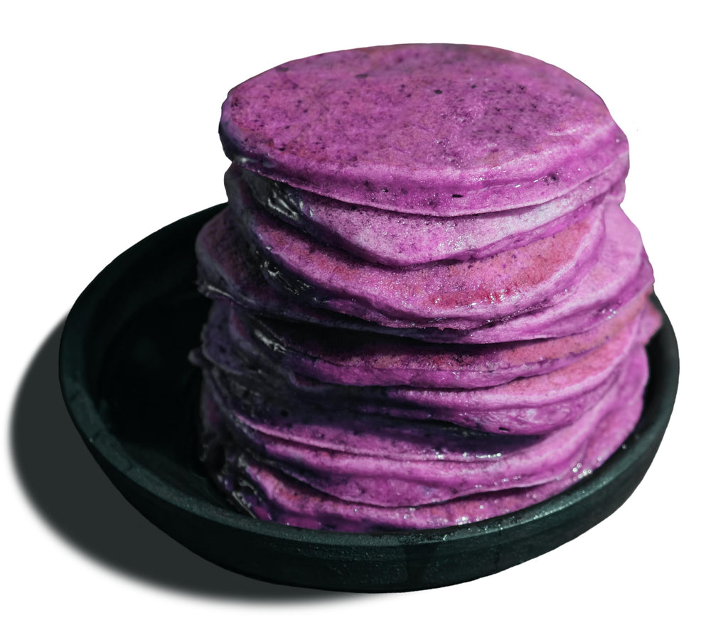 Mochi Foods Ube Pancake Mix stacked pancakes with syrup show serving versatility