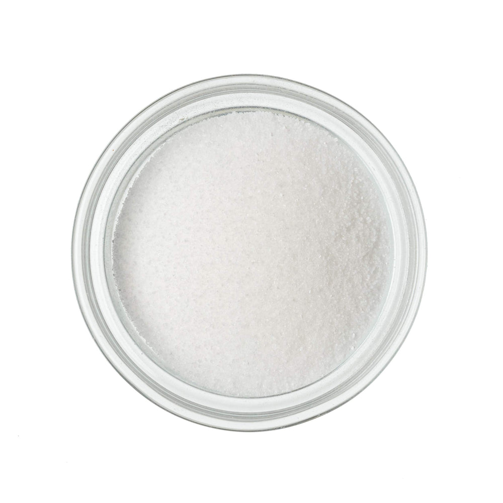Modernist Pantry Citric Acid dissolved in water, demonstrating acidity for beverages.